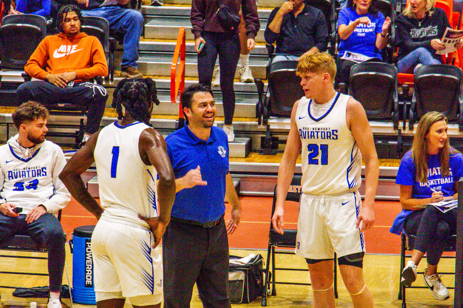 Aviators Soar to Victory in First Home Basketball Game